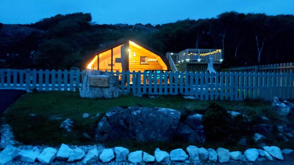 Selkie Cabin lit up in the evening